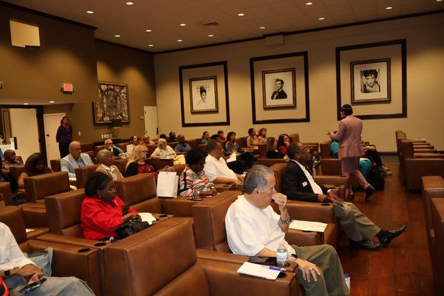 Caregivers fill the room at Forest Trace Senior Living as Dr. Erik Ilyayev presents