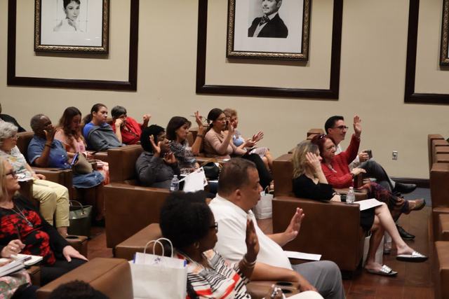 Dr. Erik speaking with caregivers during his session