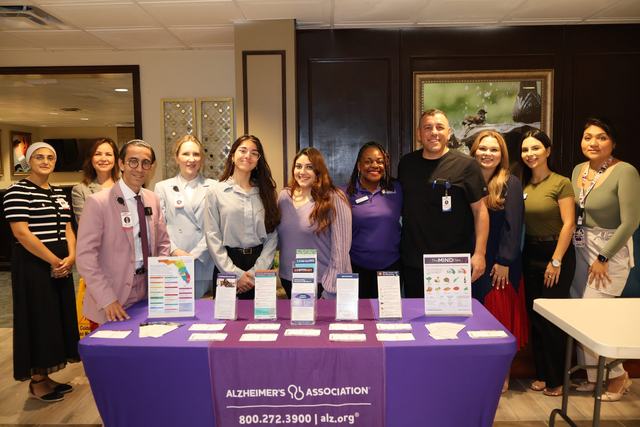 Partners and volunteers at the Alzheimer’s Association table
